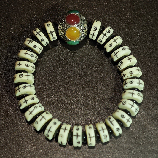 Tibetan Bone Bracelet with Symbolic Inlays